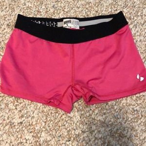 Pink “volleyball shorts”